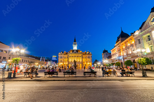 Novi Sad, Serbia - July 19, 2019: Freedom Square (serbian: Trg slobode) is the main square in Novi Sad. The photo shows County government office (City house) and monument of Svetozar Miletic.