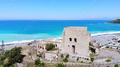 Ancient tower on the italian sea photo