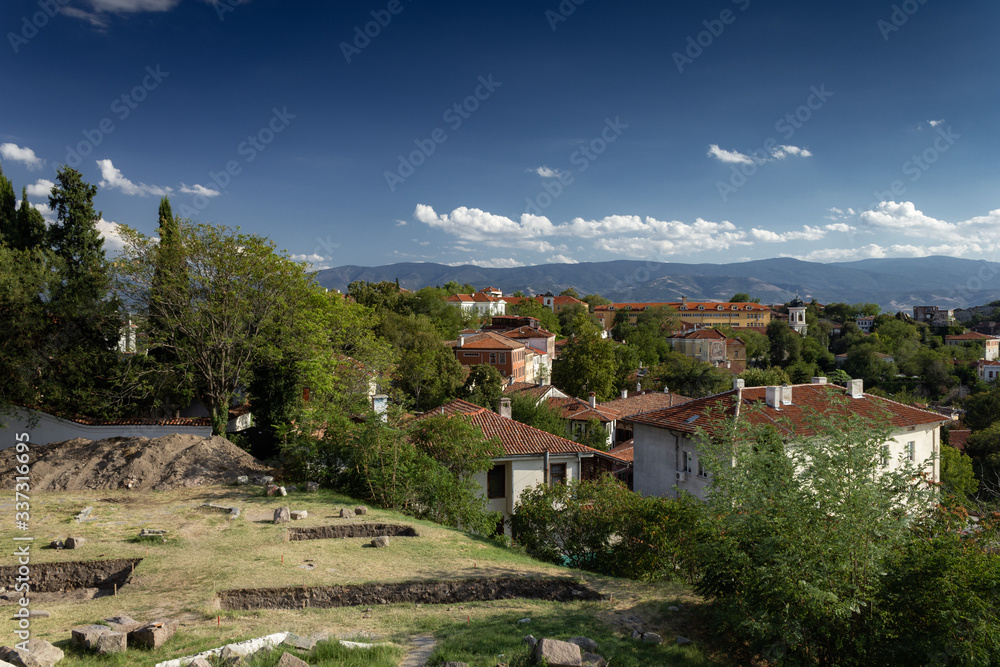 Fototapeta premium Plovdiv in Bulgaria during summer day with clouds