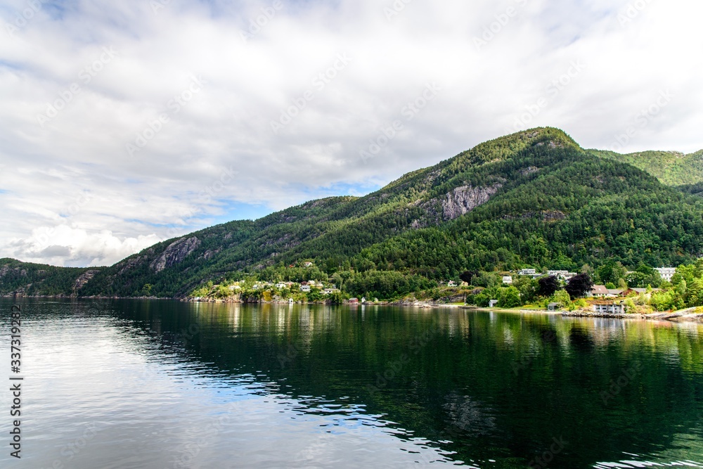 Idyllic view on Hardangerfjord by Jondal, Norway.