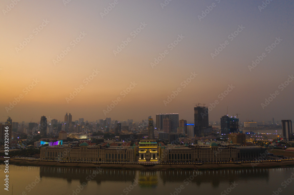 Naklejka premium Phnompenh capital of Cambodia on the sunset with beautiful landscape by drone
