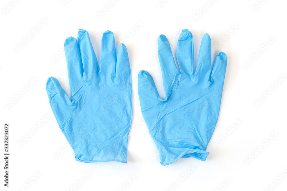 A pair of thin blue medical latex gloves Disposable rubber medical gloves. Protective subjects. Remedies. A pair of thin blue medical latex gloves Disposable rubber medical gloves. Protective subjects. Remedies.