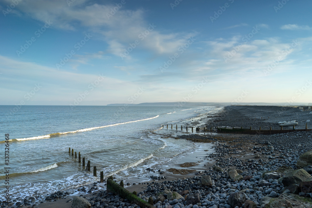 Westward Ho as the waves roll in on the North Devon coast of England