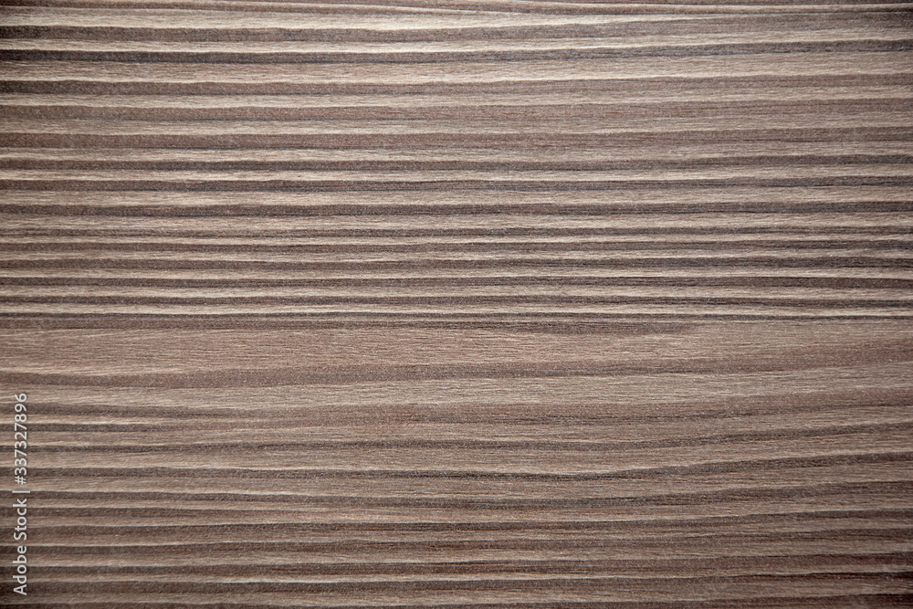 Brown grainy wood background texture, close-up Brown grainy wood background texture, close-up