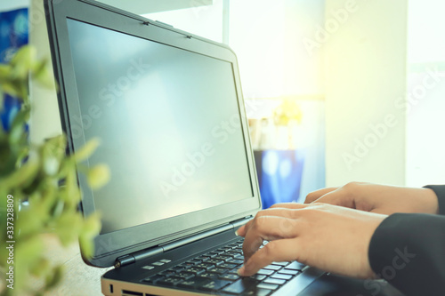 Front view of Mockup with blank screen laptop