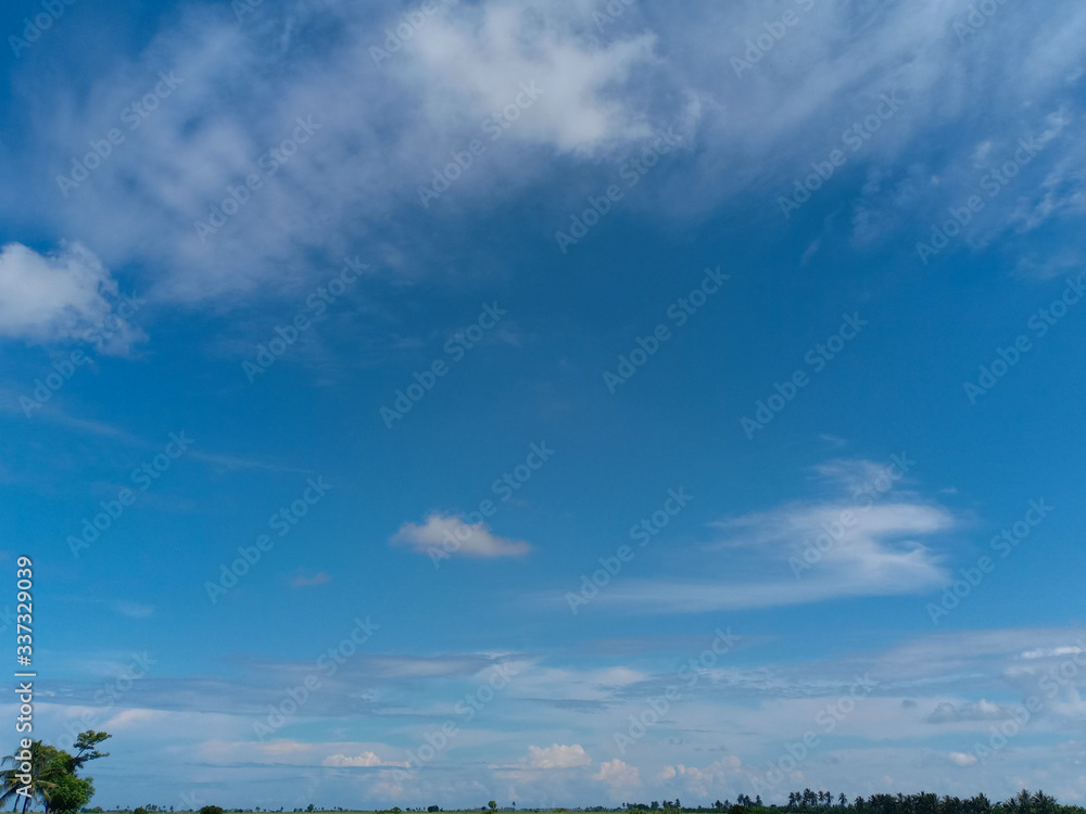 white clouds with blue sky