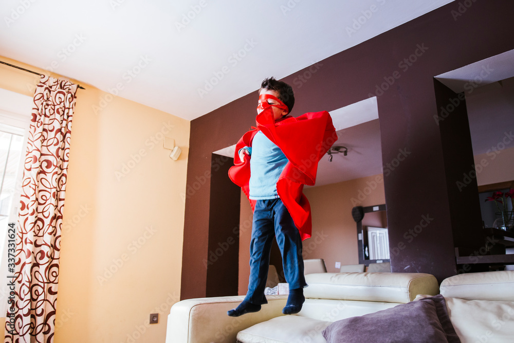 little boy playing superheroes in quarantine time,coronavirus pandemic
little boy playing superheroes in quarantine time,coronavirus pandemic