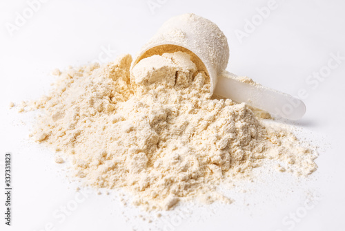heap of protein powder on white