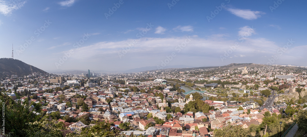 Tbilisi, Georgia - 10.10.2018:  panorama Tbilisi Old Town, Top view on the  the city.  Travel in a summer or autumn day