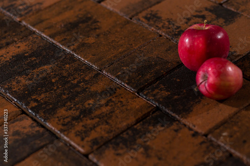 still life with apples on the sidewalk pedestrian street tile