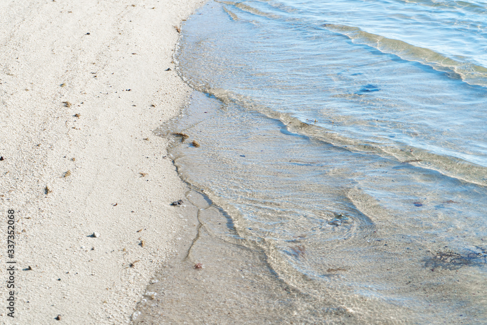 Tropical beach with white fine sand and clear clear ocean water. Tropical beach with white fine sand and clear clear ocean water.