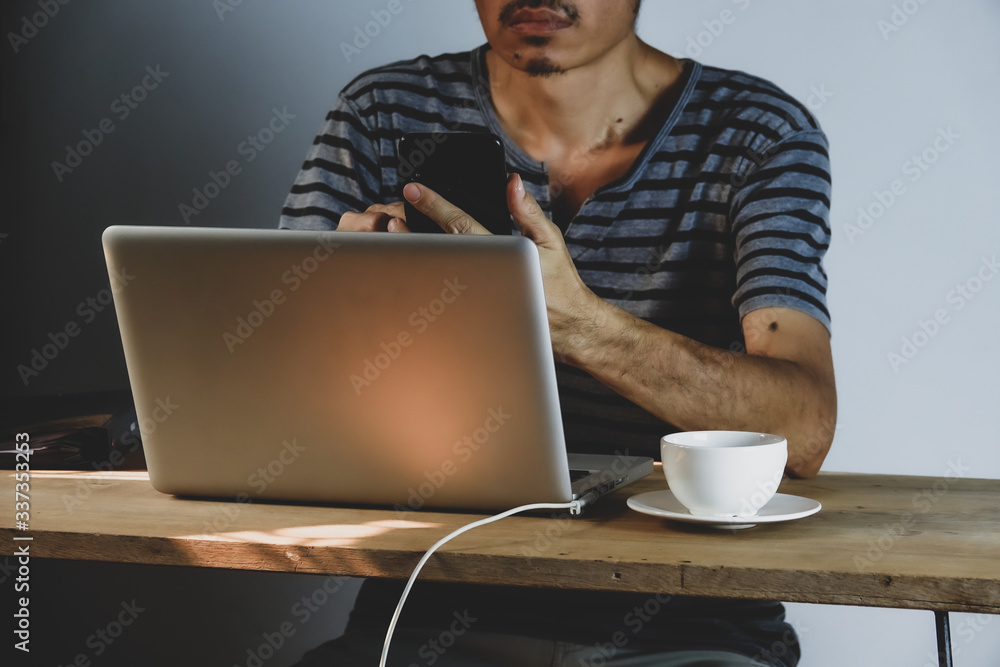 Asian man working from home online with undressed, laptop at home becouse of covid-19 Asian man working from home online with undressed, laptop at home becouse of covid-19