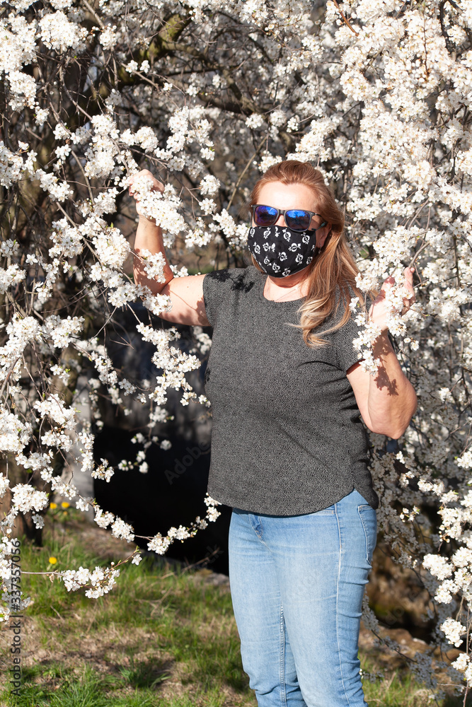 Covid 19. Woman with mask.
Woman outdoors during a global flu pandemic.