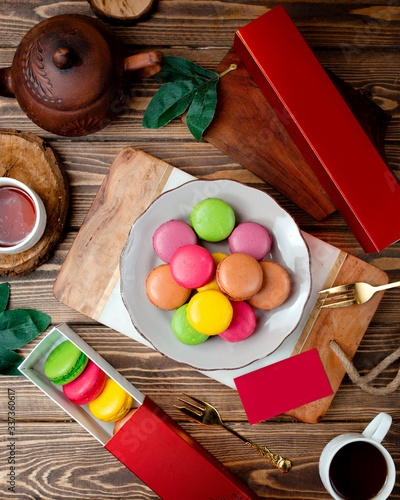 various macarones on the table top view photo