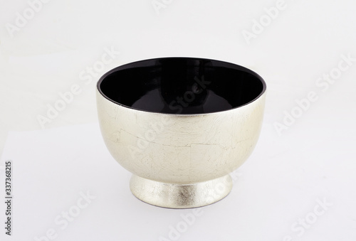 earthenware pottery made of clay fired to a porous state that can be made impervious to liquids by the use of a glaze.