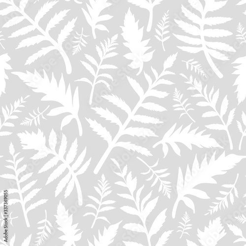 Seamless floral pattern with white leaves isolated on light gray background. Flat template.