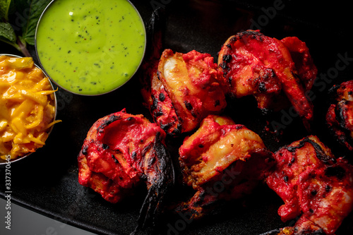tandoori shrimp baked in the oven, traditional Indian dish photo