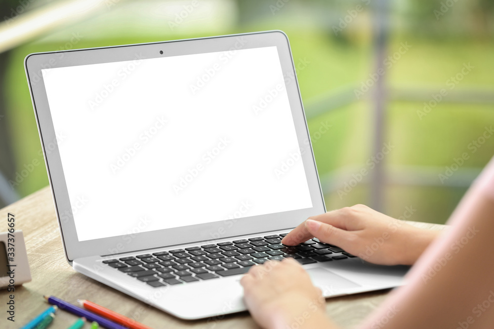 Woman using modern computer at table in office, closeup. Space for design Woman using modern computer at table in office, closeup. Space for design