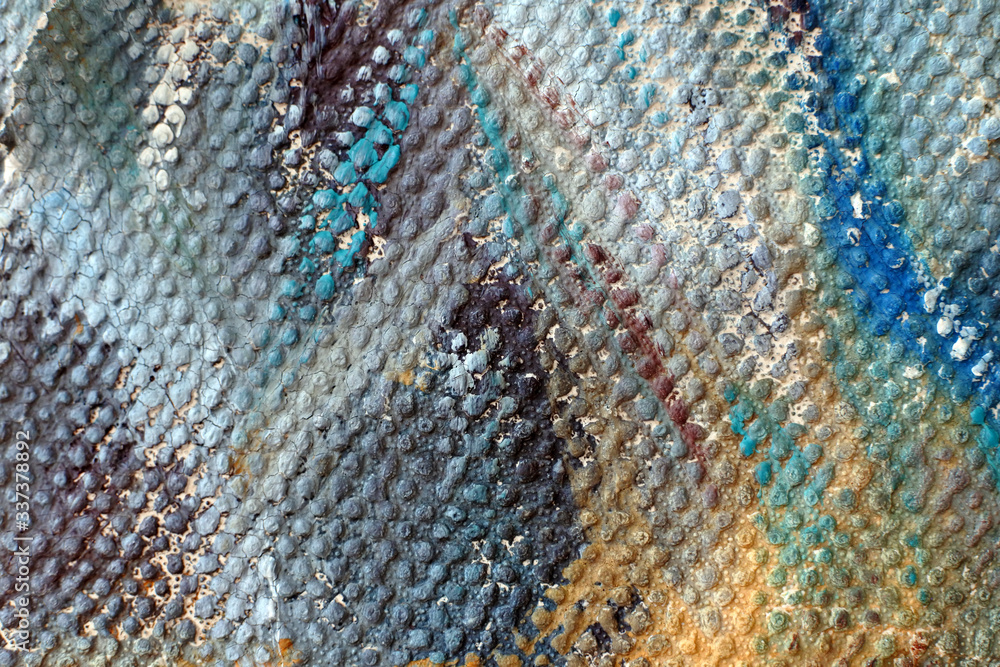 Colored spot on the dotted wallpaper. Abstract sketch on coarse-grained paper. Colored spot on the dotted wallpaper. Abstract sketch on coarse-grained paper.