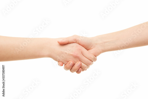 Two women hands shaking