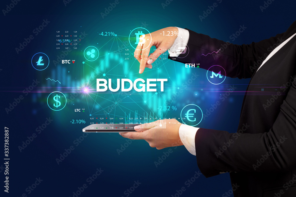 Close-up of a touchscreen with BUDGET inscription, business opportunity concept Close-up of a touchscreen with BUDGET inscription, business opportunity concept