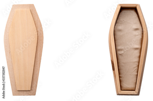 Sadness and grief, simple funeral and halloween vampire ornament concept with basic wood coffin isolated on white background with clipping path cutout and copy space photo