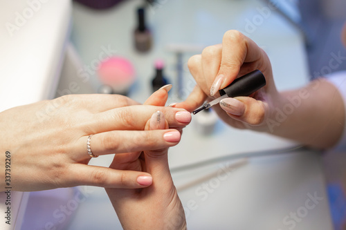 woman hands with nail polish