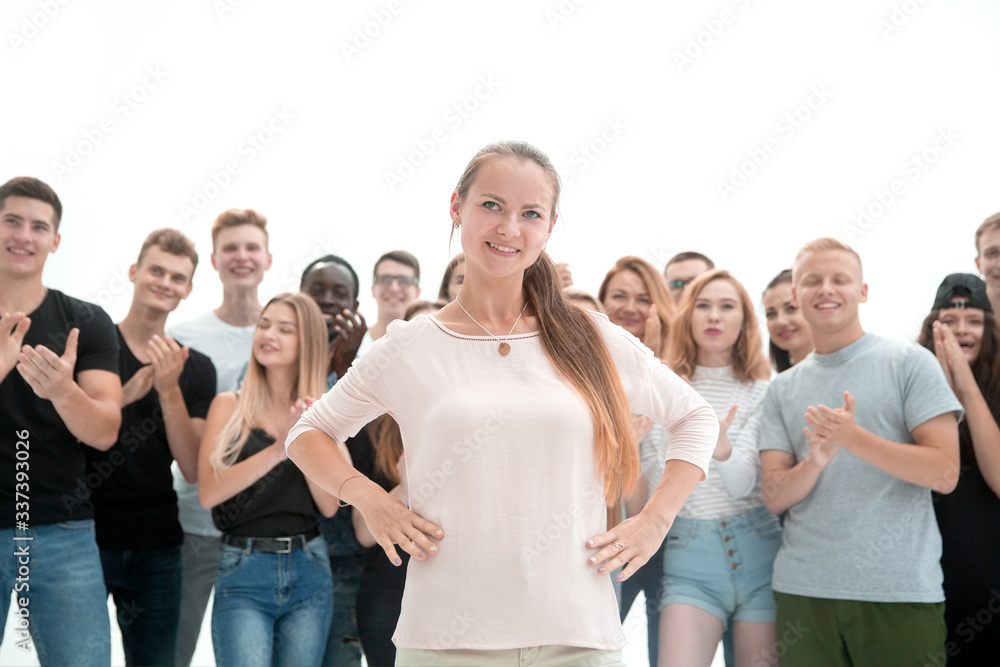 Obraz premium group of diverse young people applauding their leader