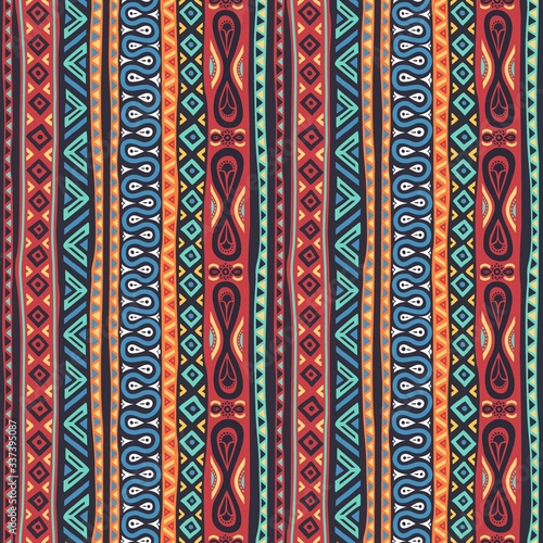 Seamless multicolored ethnic pattern with geometric, floral, decorative and fashion elements. For wallpaper, textiles, souvenirs, printing and prints.