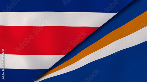 The flags of Costa Rica and Marshall Islands. News, reportage, business background. 3d illustration