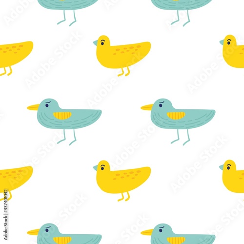Seamless pattern of colorful birds. Blue and yellow cartoon birds.Suitable for wrapping paper and bedding.