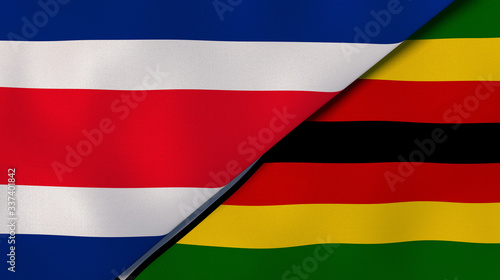 The flags of Costa Rica and Zimbabwe. News, reportage, business background. 3d illustration