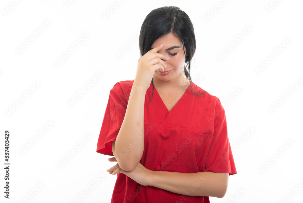 Portrait of young attractive female nurse making problem gesture Portrait of young attractive female nurse making problem gesture