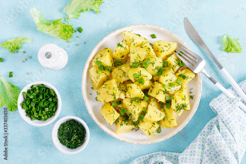 Boiled new potato with butter, dill and green onion