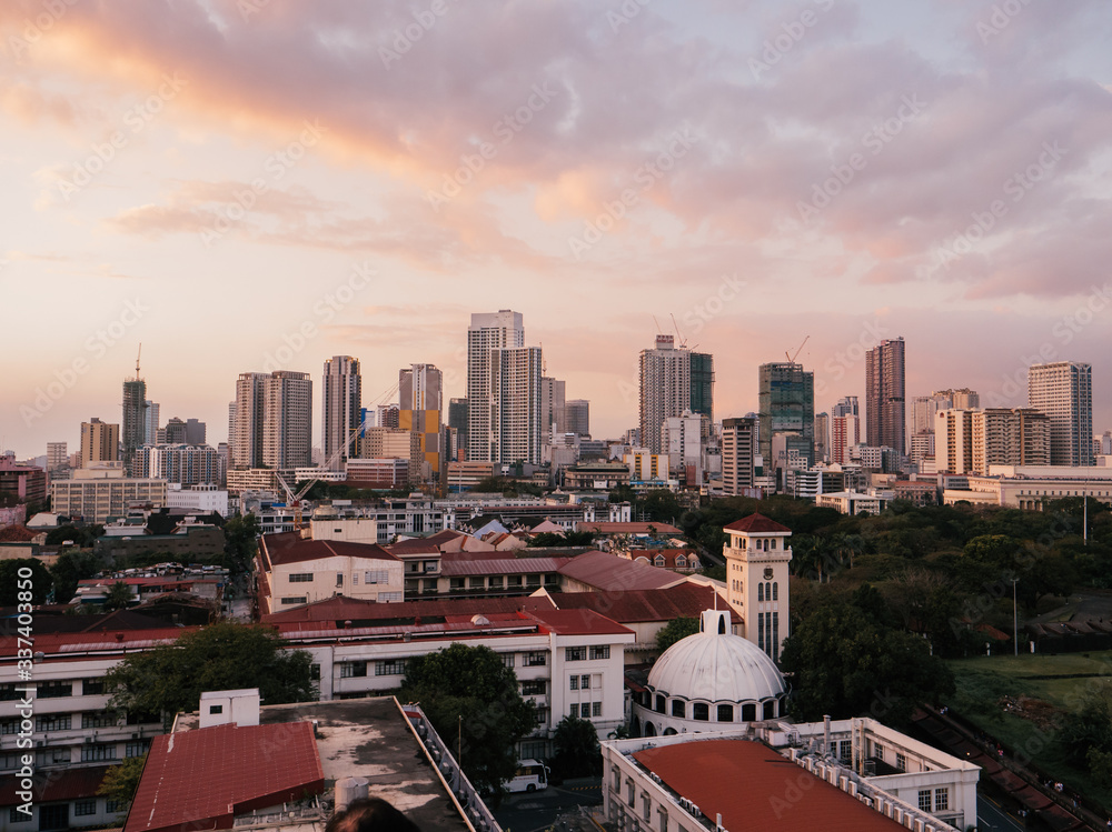 Skyline of Binondo District in Metro Manila while sunset Stock Photo