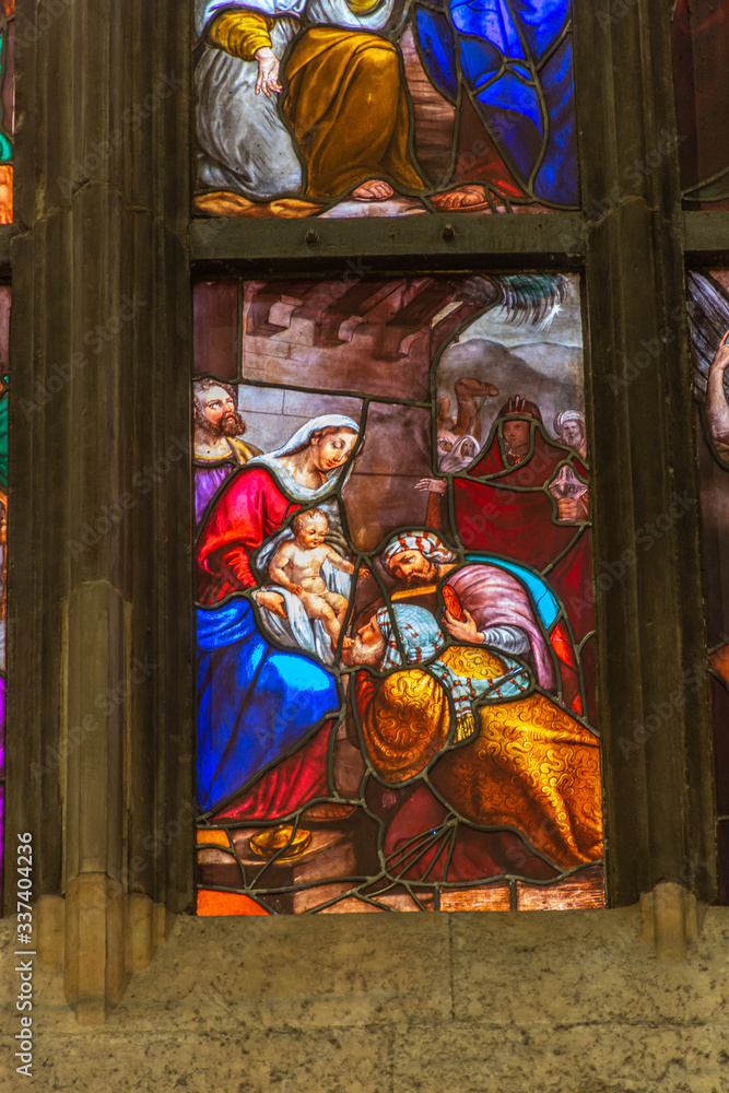 Fototapeta premium Italy, Milan, February 12, 2020, view of stained glass windows in the interior of the Duomo