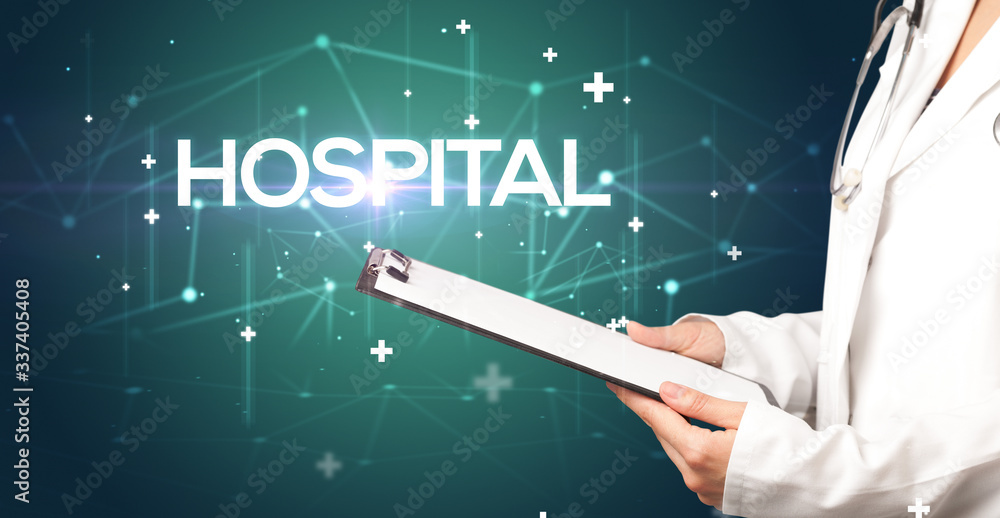 Doctor fills out medical record with HOSPITAL inscription, medical concept Doctor fills out medical record with HOSPITAL inscription, medical concept