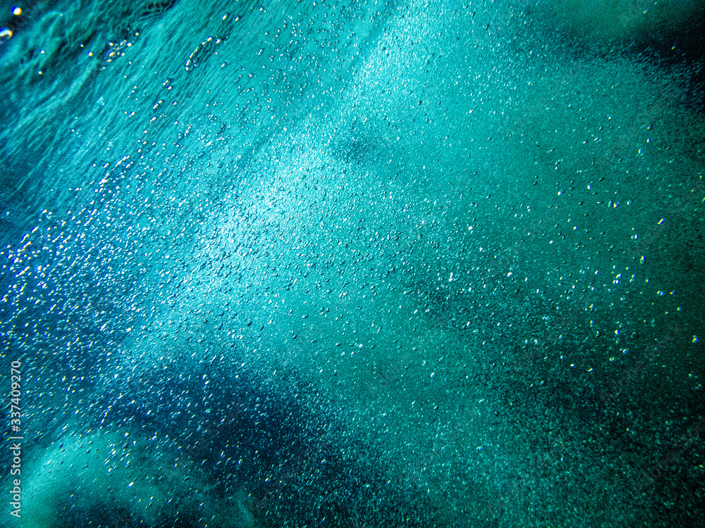 Underwater photography of  splashing bubble.