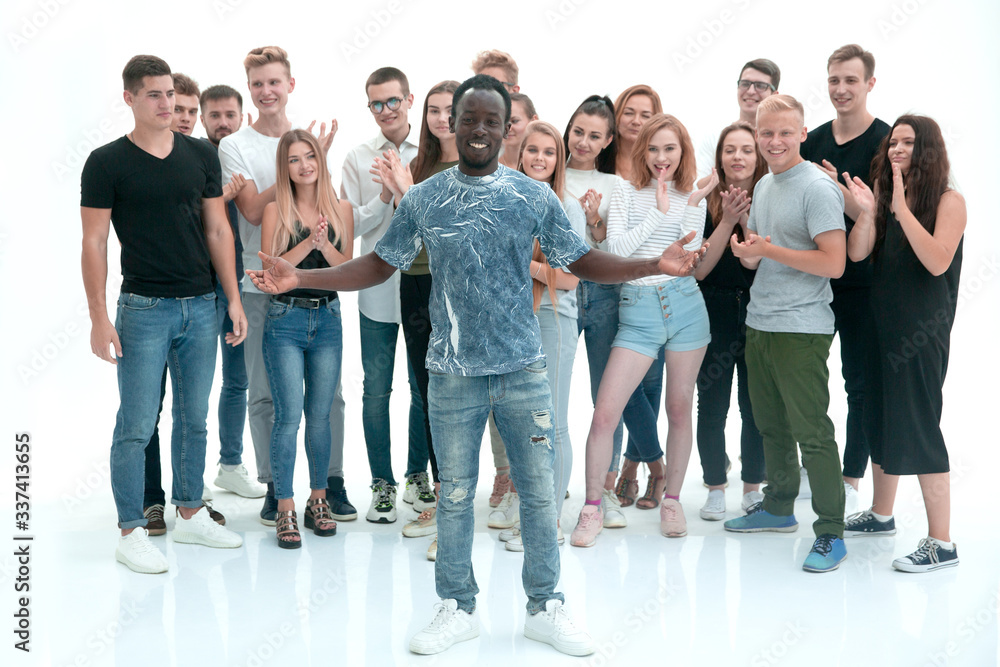 happy guy standing in front of his friends team