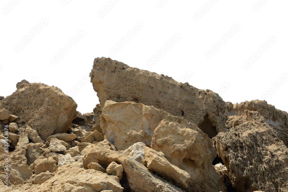 Pile of huge stones, part of a rocky shore, isolated on a white background