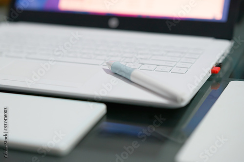 pen mouse on keyboard of notebook with copy space