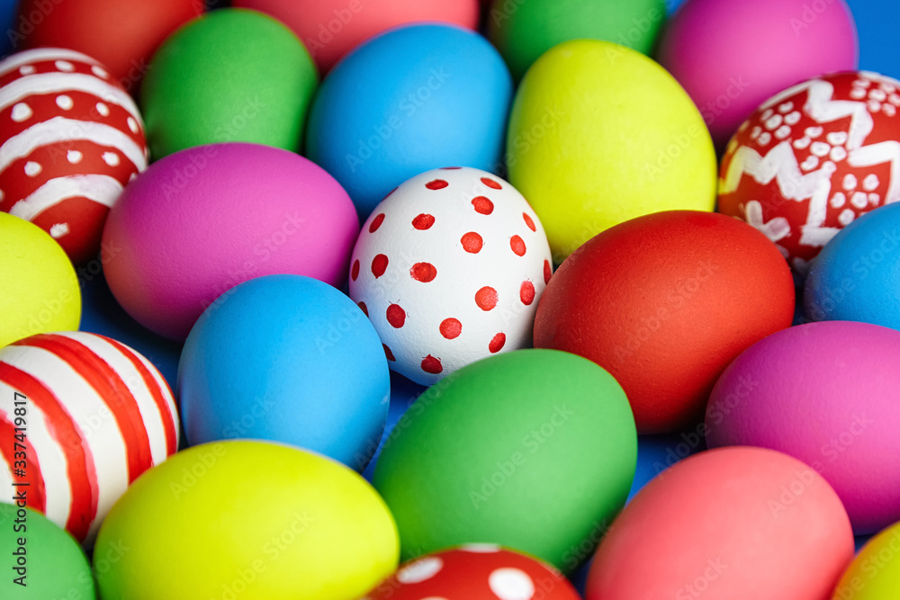 Fototapeta premium Easter Eggs colorful background. Easter Sunday or Easter Day (Pascha)