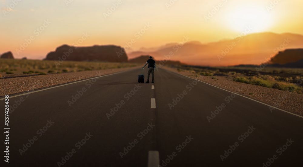 traveler men standing on road with evening beautiful Sunset scene.