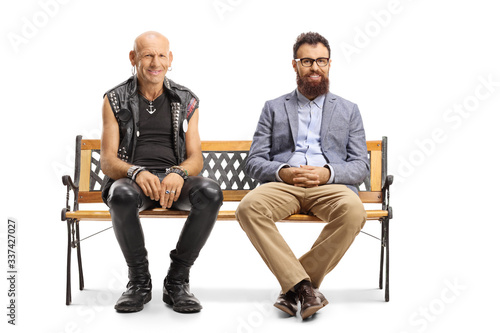 Bald punk and bearded man sitting on a bench