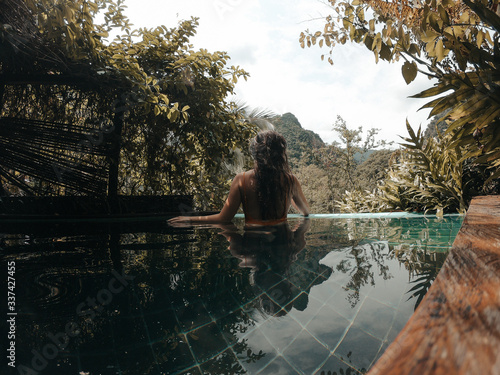 Woman enjoying outdoor pool in Colombia
