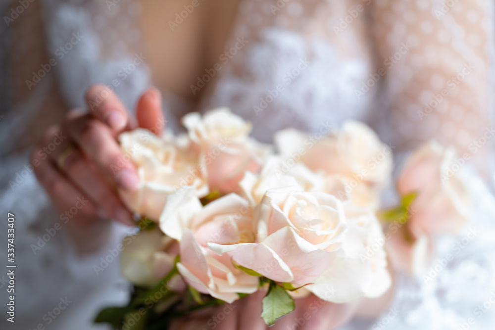 wedding bouquet in hands of the bride wedding bouquet in hands of the bride