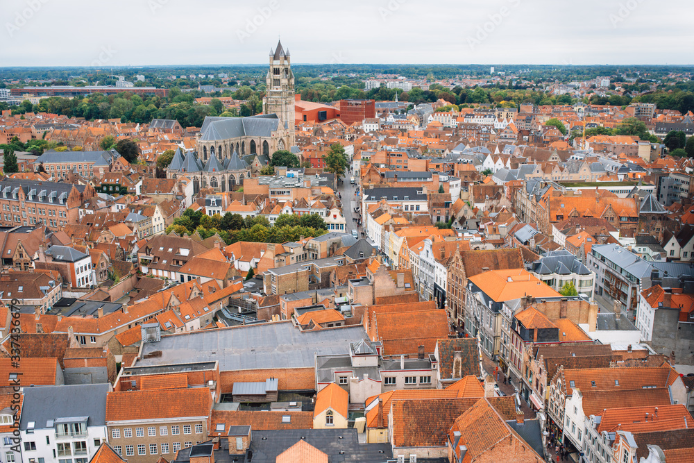 Panoramic view from the Belfort tower on the historic part of Bruges and the Cathedral of St. Salvator, the main pedestrian street with many shops, Belgium. Travel to Belgium.