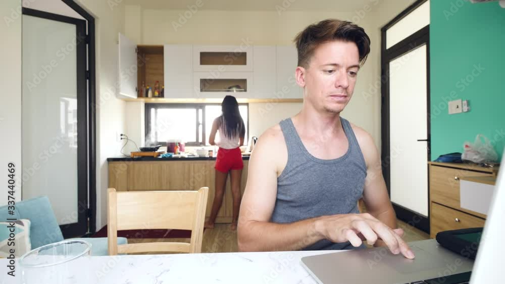 Caucasian man working at home with laptop, stress upset getting bad news. Caucasian man working at home with laptop, stress upset getting bad news.