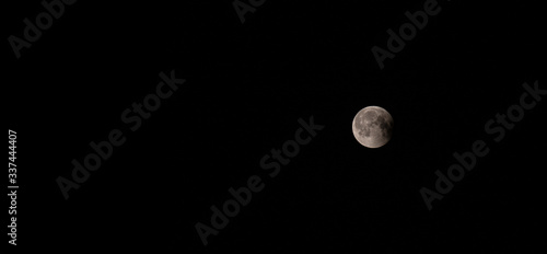 full moon over black