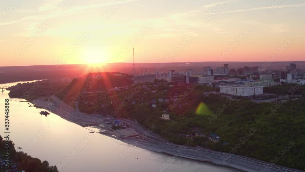 Ufa city aerial view to Monument to Salavat Yulaev and Cultural center of the city at beautiful sunset at background through Belaya river in Bashkortostan Ufa city aerial view to Monument to Salavat Yulaev and Cultural center of the city at beautiful sunset at background through Belaya river in Bashkortostan